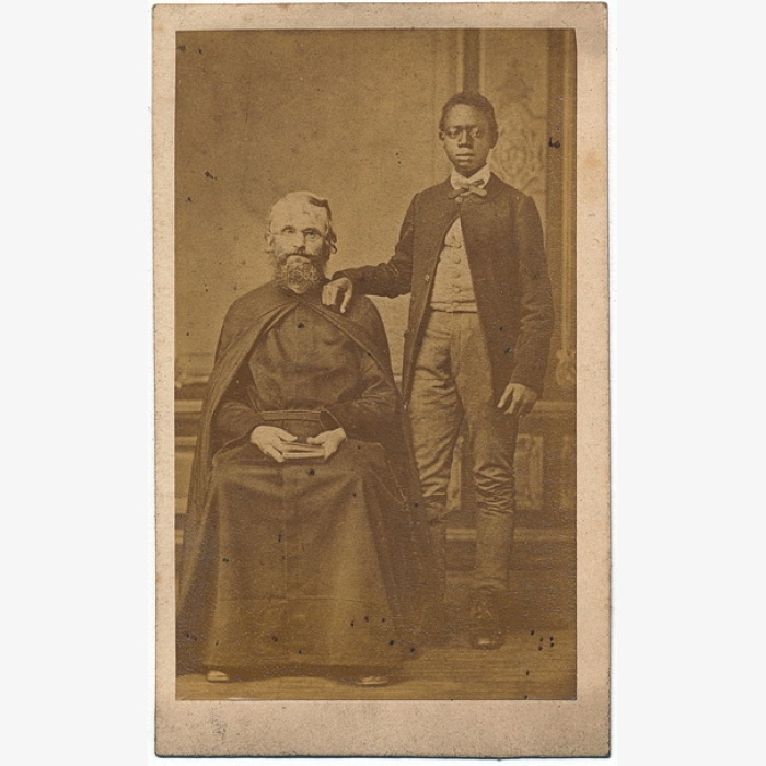 Priest and an African American Boy