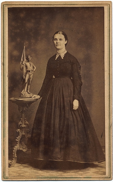 Female Subject and a Soldier's Statue